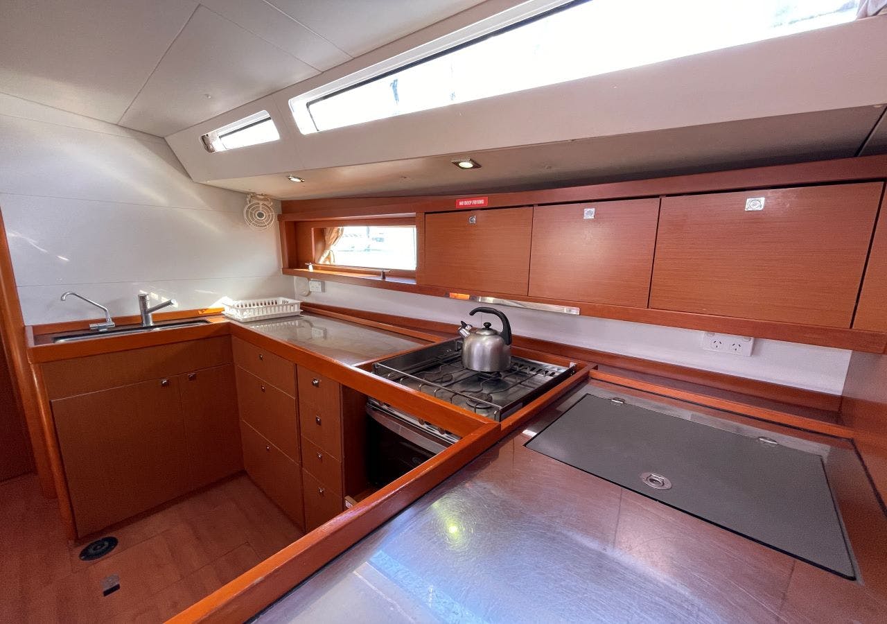 Book Oceanis 48 - 5 cab. Sailing yacht for bareboat charter in Whitsundays, Airlie Beach, Coral Sea Marina, Whitsunday Region of Queensland, Australia and Oceania with TripYacht!, picture 7