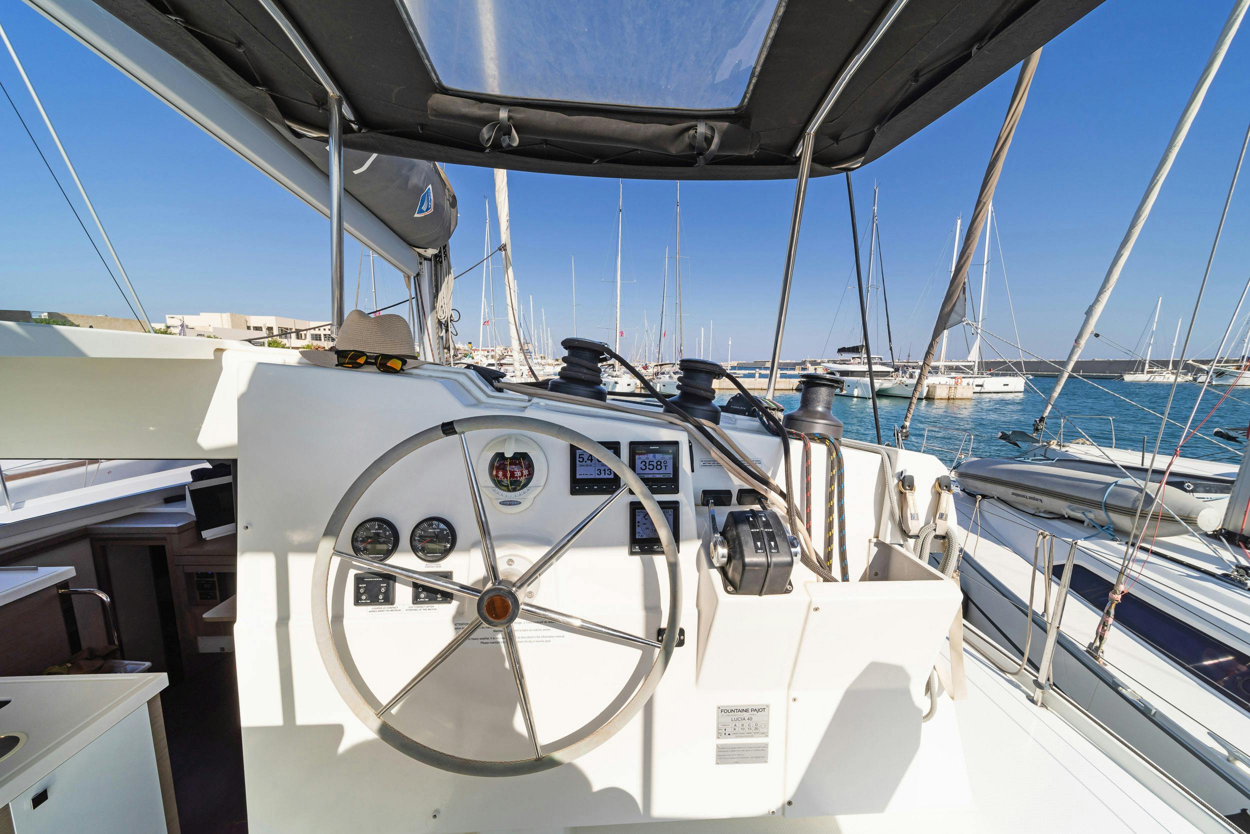 Book Fountaine Pajot Lucia 40 Catamaran for bareboat charter in Rhodes New Marina, Dodecanese, Greece with TripYacht!, picture 17