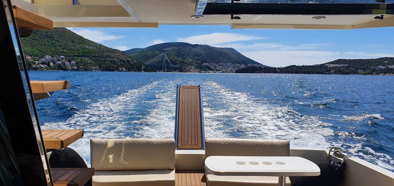 Book Ferretti Fly 43 Motor boat for bareboat charter in Dubrovnik, Gruž, Dubrovnik region, Croatia with TripYacht!, picture 4