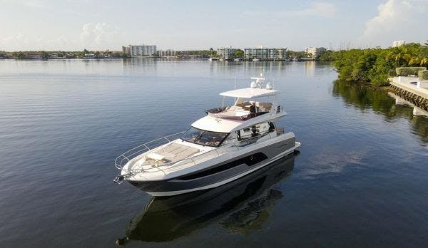 Book Prestige 590 Flybridge - 3 + 1 cab.	 Motor yacht for bareboat charter in St. Petersburg, Vinoy Marina, Florida, USA with TripYacht!, picture 1