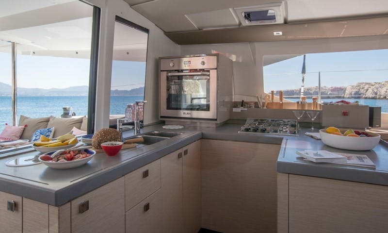 Book Fountaine Pajot Astrea 42 - 4 + 2 cab. Catamaran for bareboat charter in Cote D'Azur, Port Pin Rolland, Provence-Alpes-Côte d'Azur, France with TripYacht!, picture 8