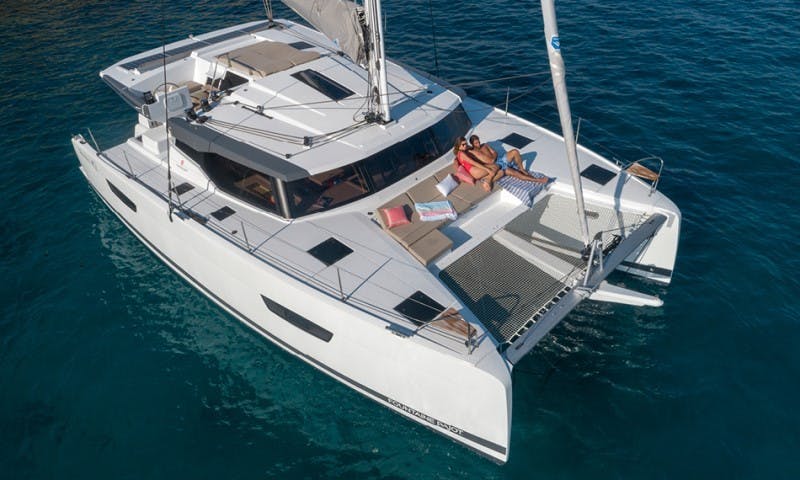 Book Fountaine Pajot Astrea 42 - 4 + 2 cab. Catamaran for bareboat charter in Cote D'Azur, Port Pin Rolland, Provence-Alpes-Côte d'Azur, France with TripYacht!, picture 4